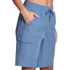 imageRBX Active Womens Relaxed Fit Breathable Ventilated Stretch Woven Athletic Walking Short with PocketsMoonlight Blue 11inch